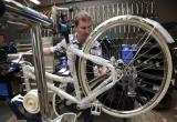 man fixing a bike